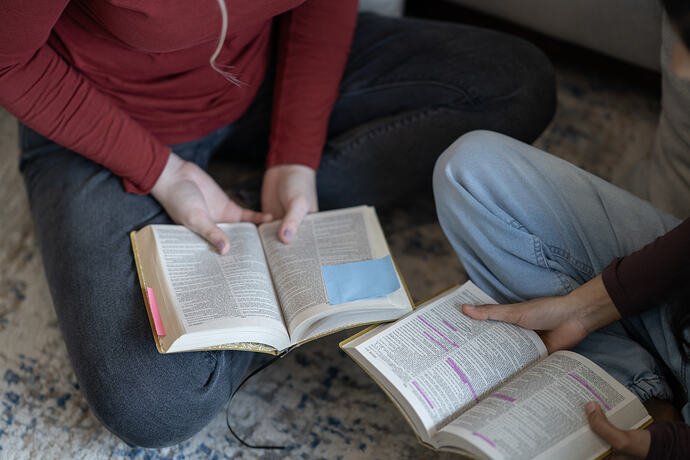 reading bible on the floor together